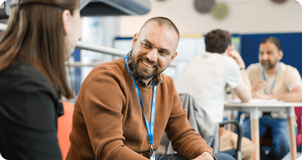 Student talking to teacher
