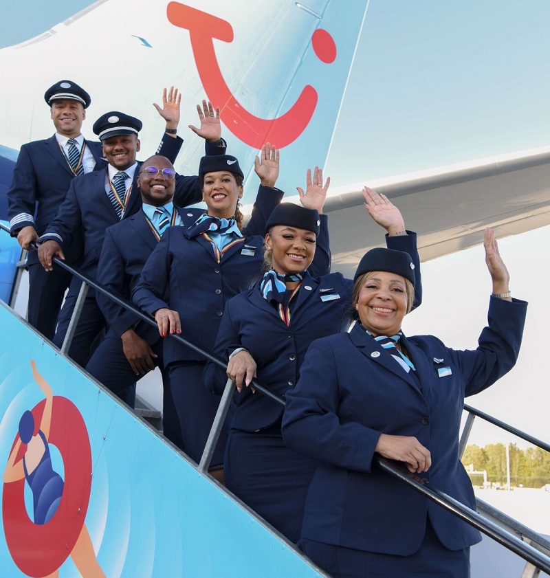 University Centre Leeds graduate Chekayha Lemmon (second from right) with her TUI cabin crew colleagues